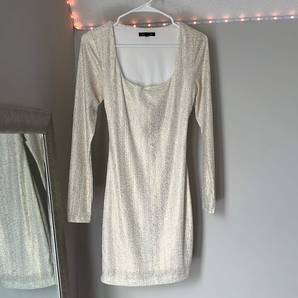 Long sleeve white mini dress with gold sparkles